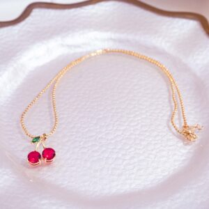 Collar Dorado con Colgante de Cerezas Rojas - Image 2